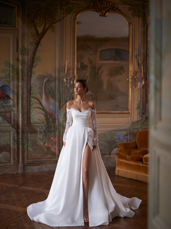 Manually added from URL: https://www.zoyaweddingcenter.sk/sites/default/files/styles/detail_galeria__tvorec/public/695fcbe36c63cad38be486f1_model-548-capella-1.jpg?itok=oBK60MPi